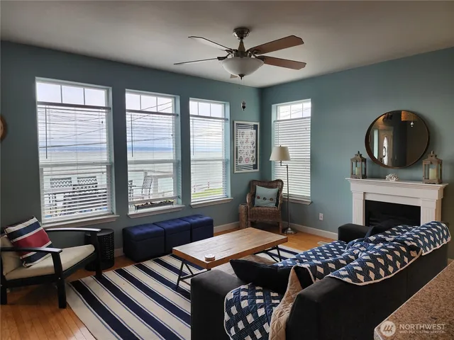 a bedroom with furniture and a fireplace