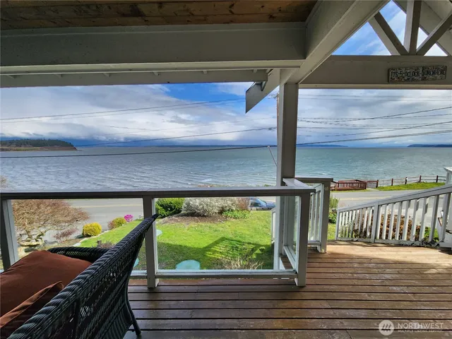 a view of a porch with furniture
