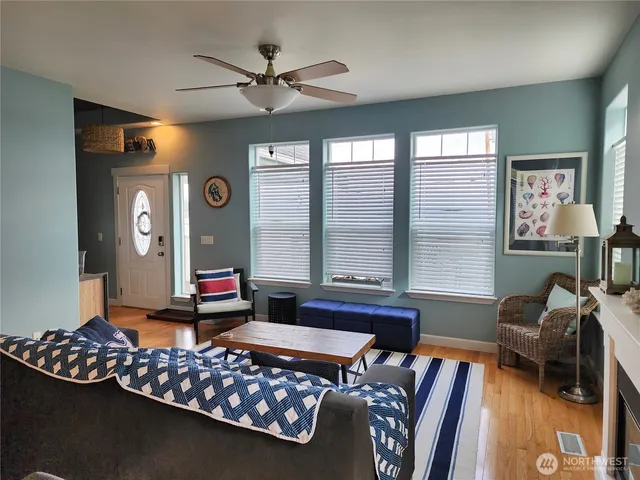 a living room with furniture and a window
