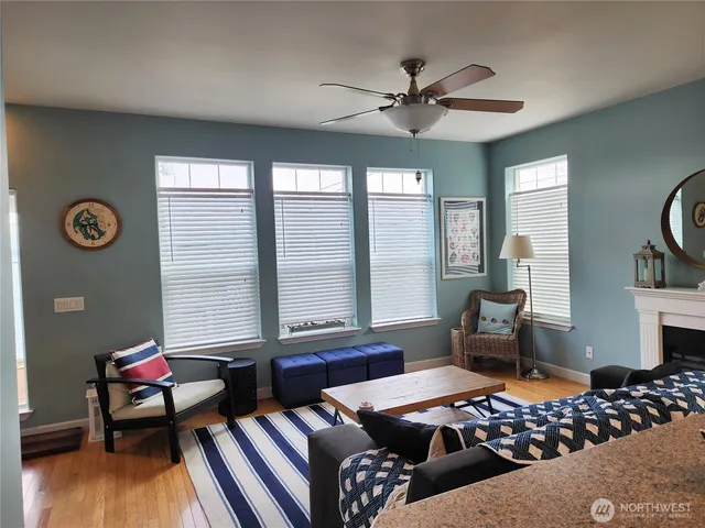 a living room with furniture and a window