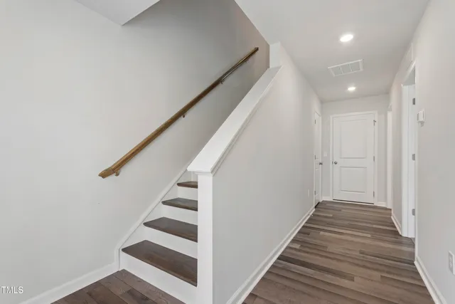 a view of entryway with wooden floor