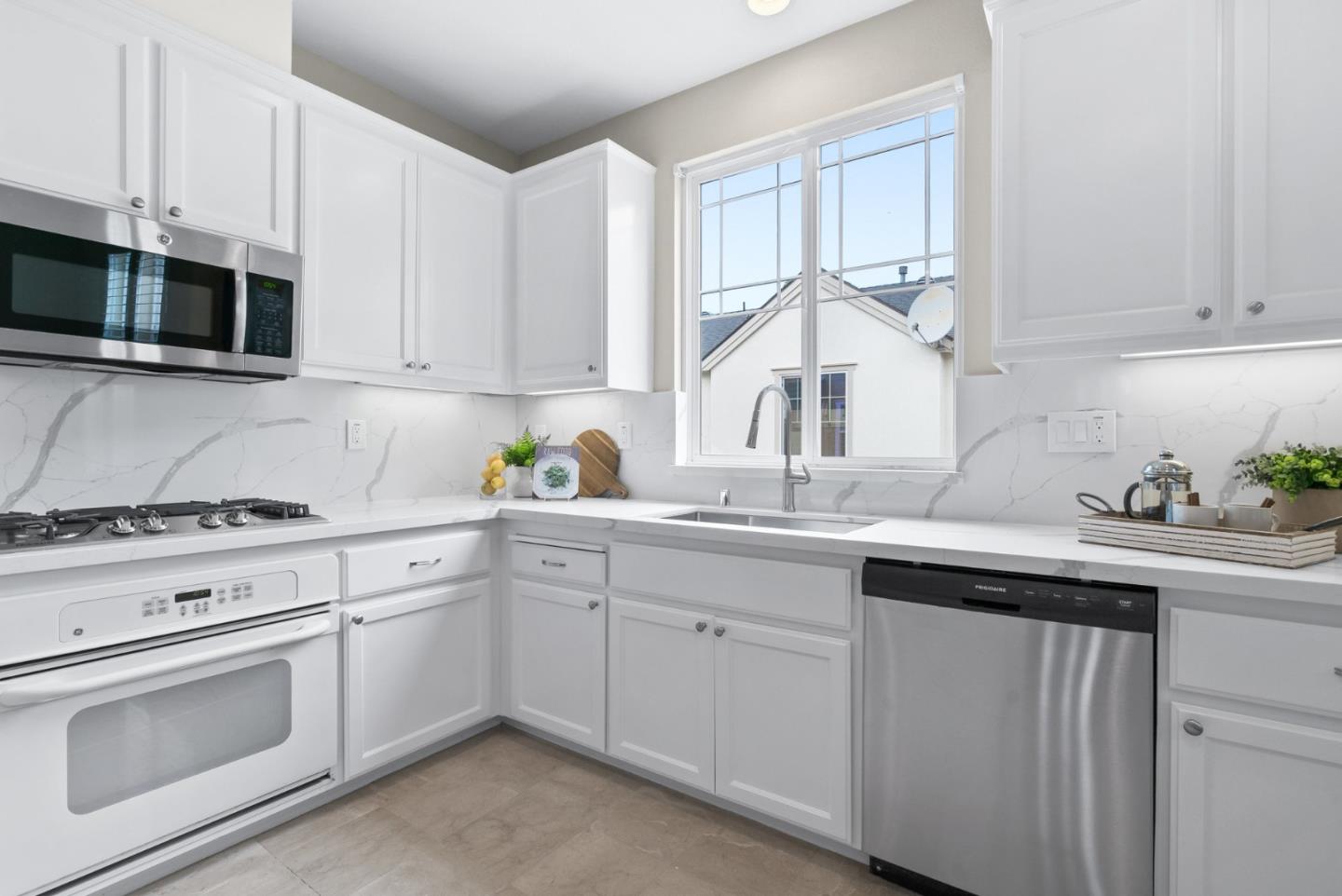 4334 Watson Circle Santa Clara, CA 95054 - Photo 15 of 38 a kitchen with white cabinets and white appliances