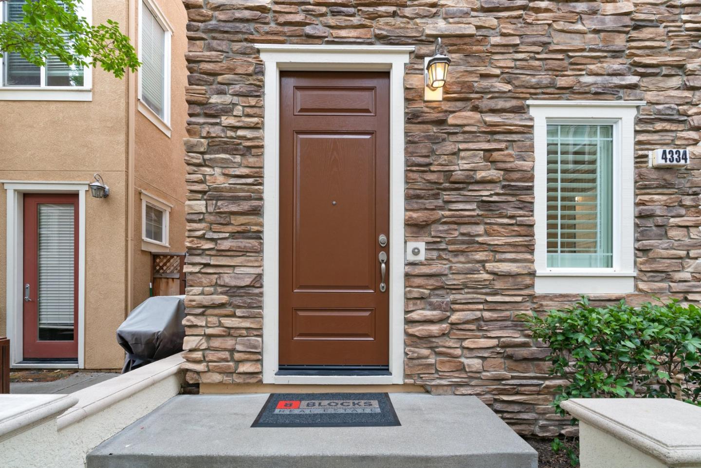4334 Watson Circle Santa Clara, CA 95054 - Photo 2 of 38 a brick house with a large windows