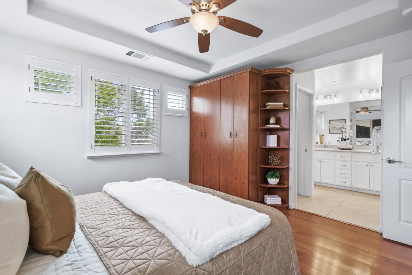 4334 Watson Circle Santa Clara, CA 95054 - Photo 26 of 38 a bedroom with a large bed and a chandelier