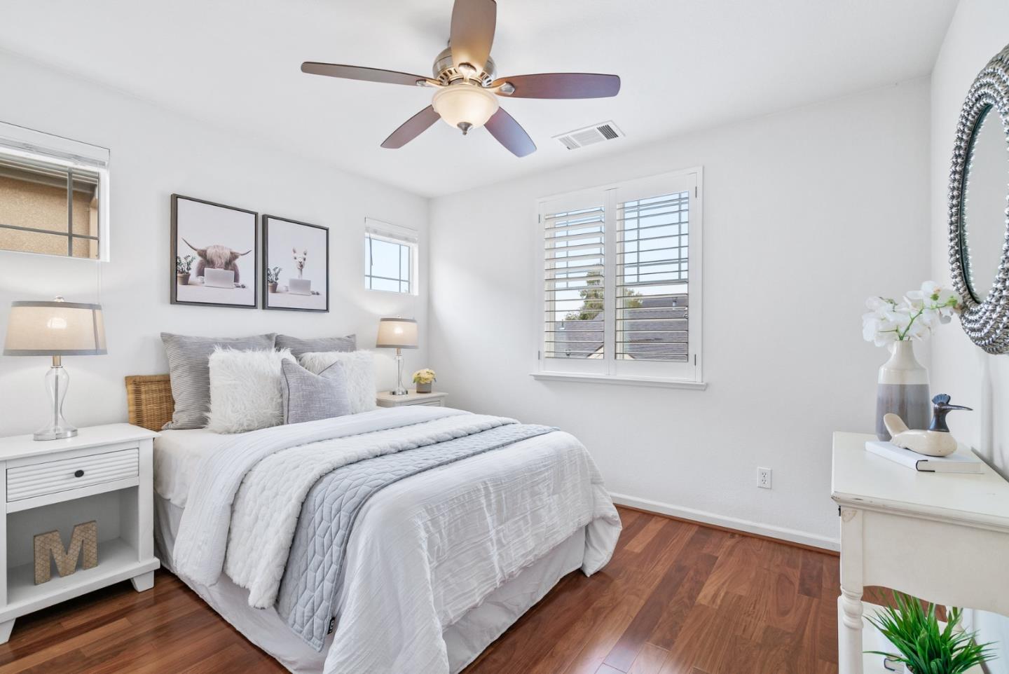4334 Watson Circle Santa Clara, CA 95054 - Photo 29 of 38 a bedroom with a large bed and a chandelier