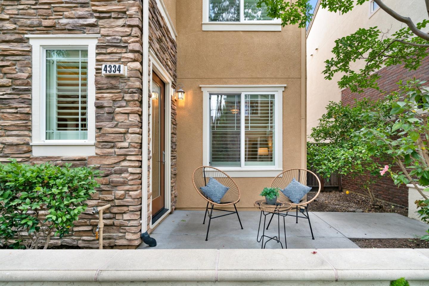 4334 Watson Circle Santa Clara, CA 95054 - Photo 3 of 38 a building outdoor space with patio furniture and potted plants