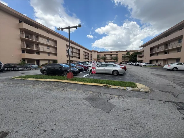 a view of a big room with windows