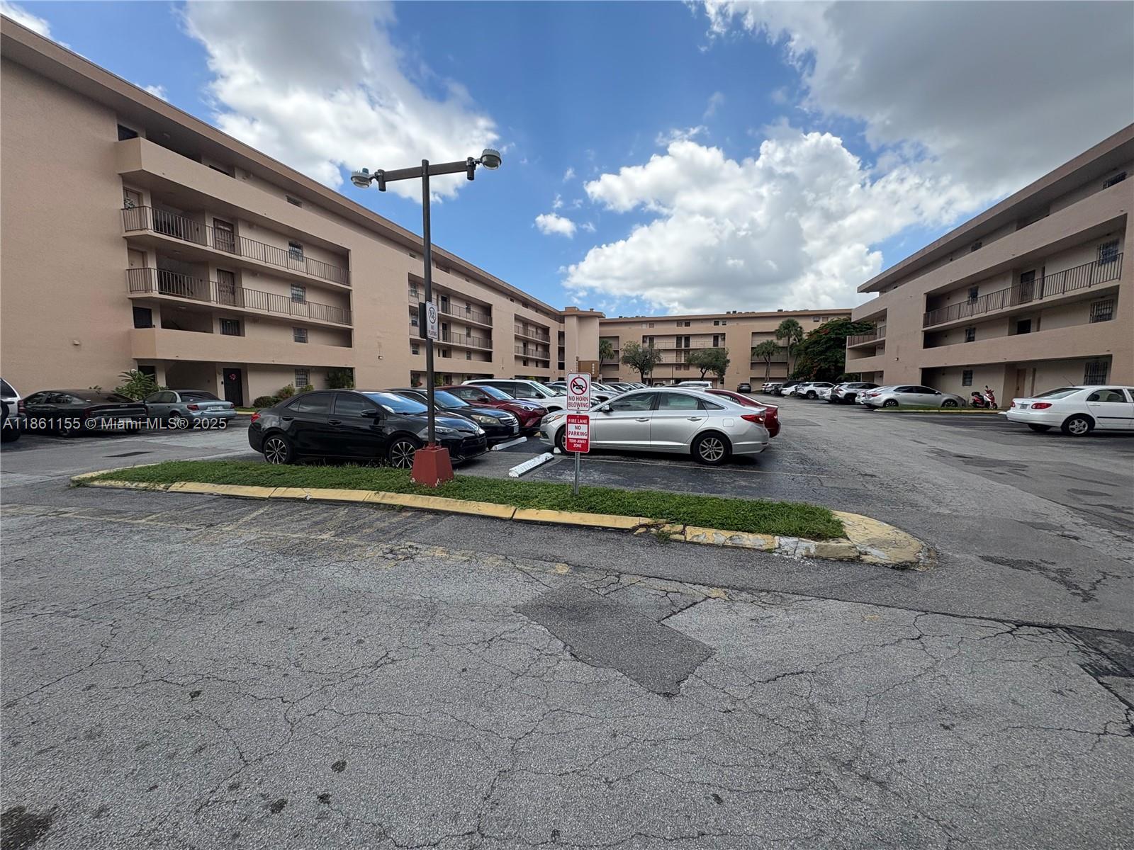 a view of a big room with windows