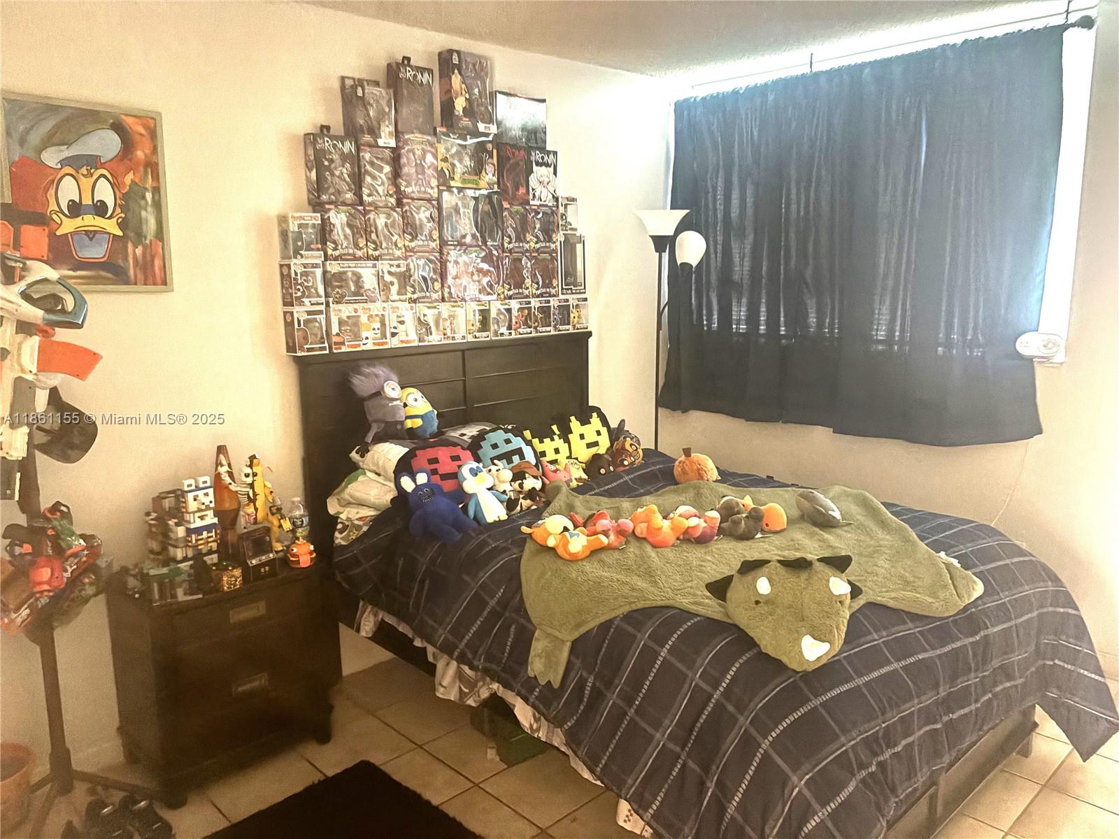 8889 Fontainebleau Boulevard, Unit 204 Miami, FL 33172 - Photo 16 of 28 a view of a dining room with furniture