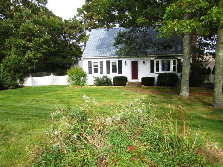 a view of a house with a big yard