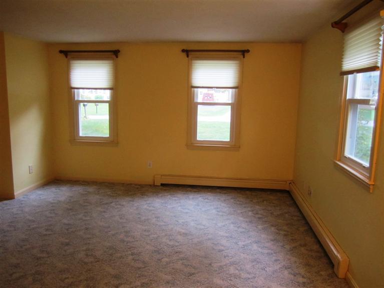 27 Pequot Road Mashpee, MA 02649 - Photo 13 of 35 an empty room with windows