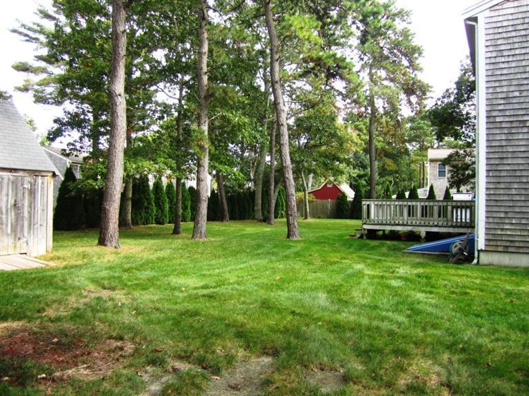 27 Pequot Road Mashpee, MA 02649 - Photo 34 of 35 a view of a park with large trees