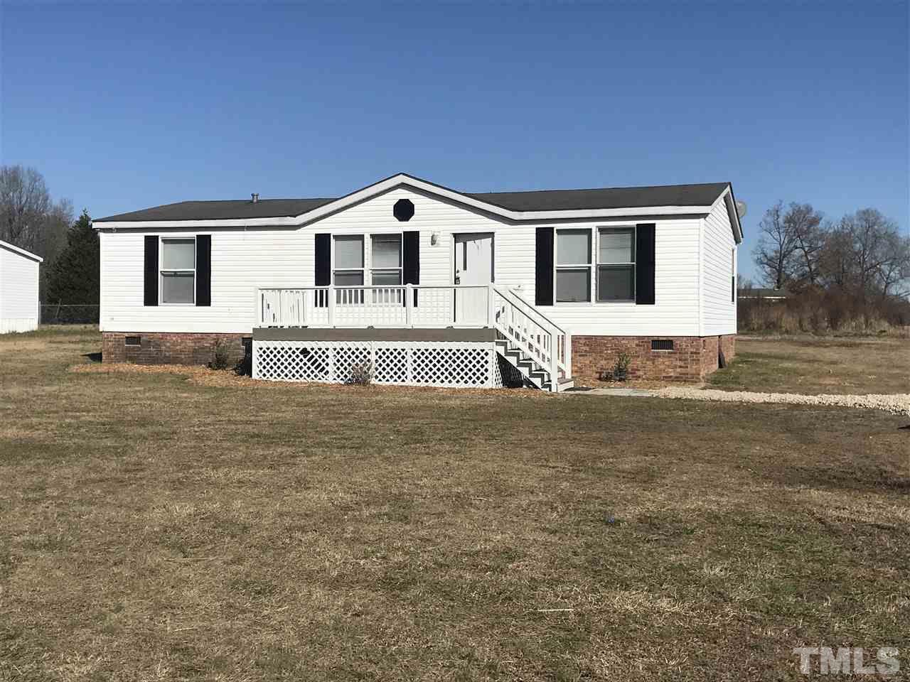 368 Massengill Pond Road Angier, NC 27501 - Photo 2 of 19 a front view of a house with a yard