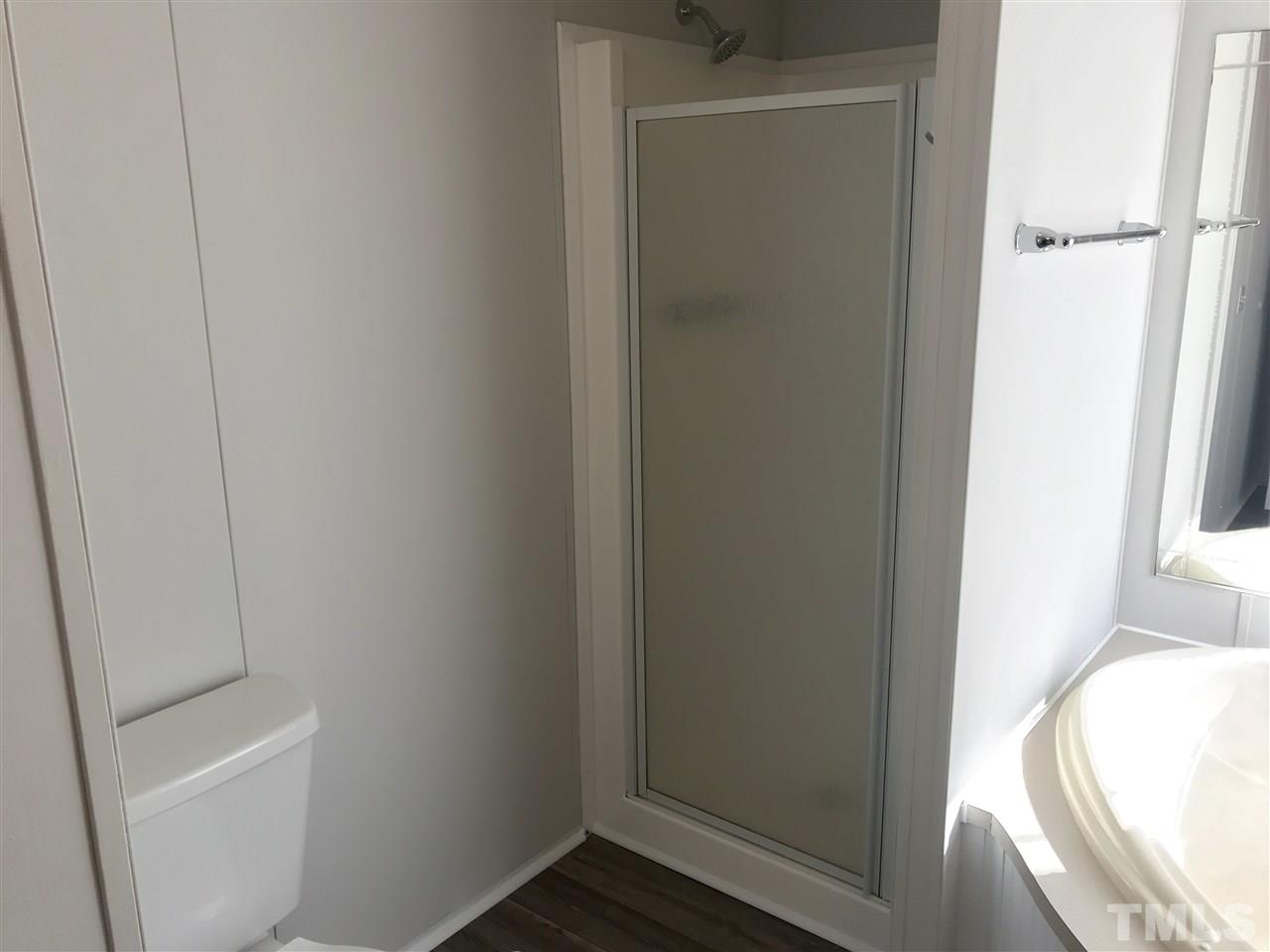368 Massengill Pond Road Angier, NC 27501 - Photo 15 of 19 a bathroom with a bathtub
