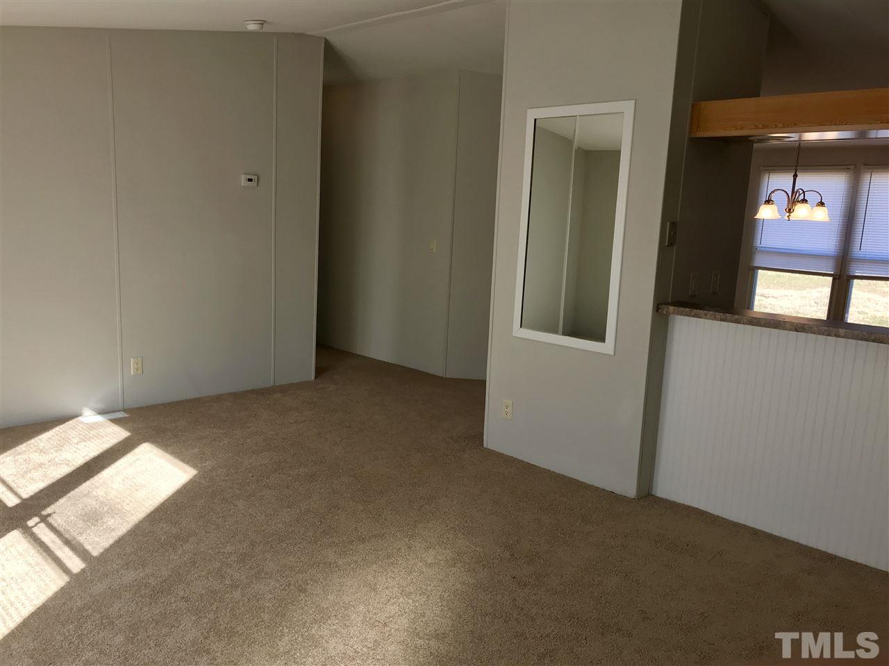 368 Massengill Pond Road Angier, NC 27501 - Photo 17 of 19 an empty room with windows