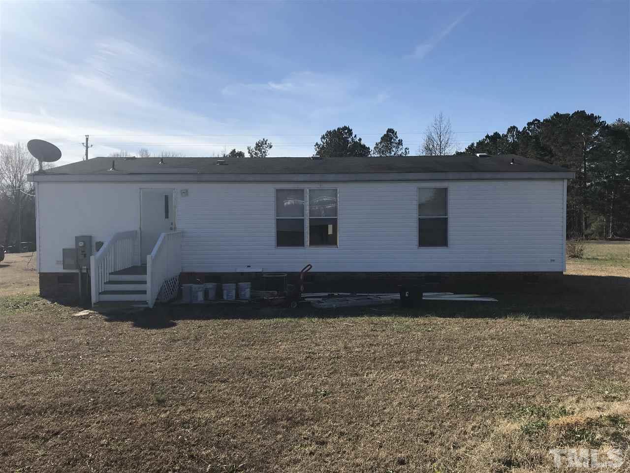 368 Massengill Pond Road Angier, NC 27501 - Photo 3 of 19 a front view of a house with a yard