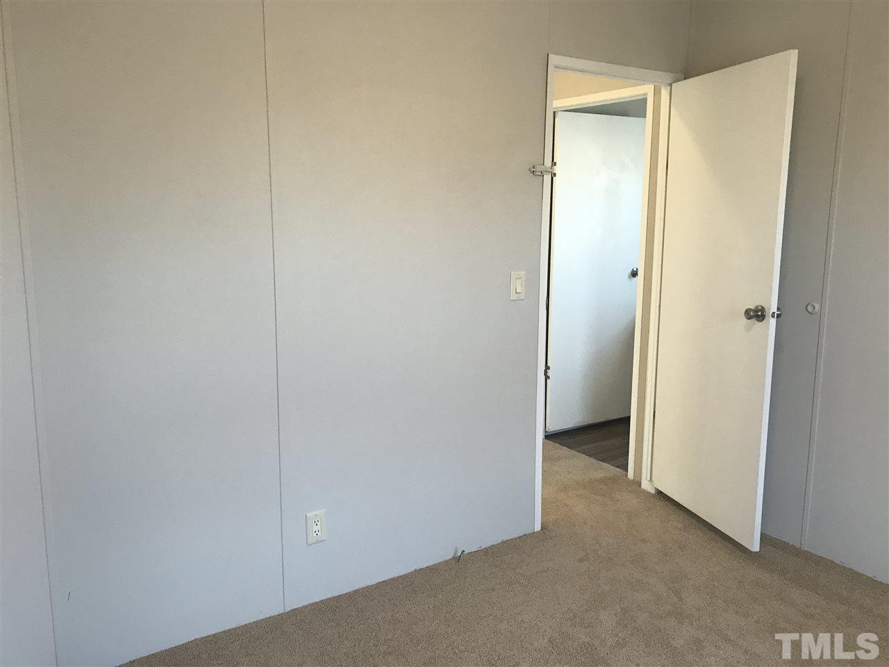 368 Massengill Pond Road Angier, NC 27501 - Photo 7 of 19 a view of an empty room