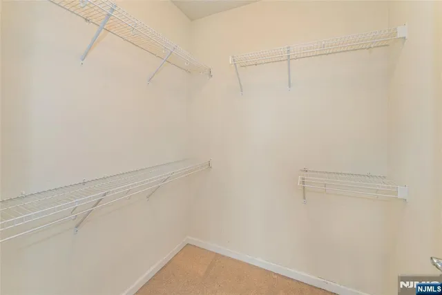 a view of a room with racks on the wall