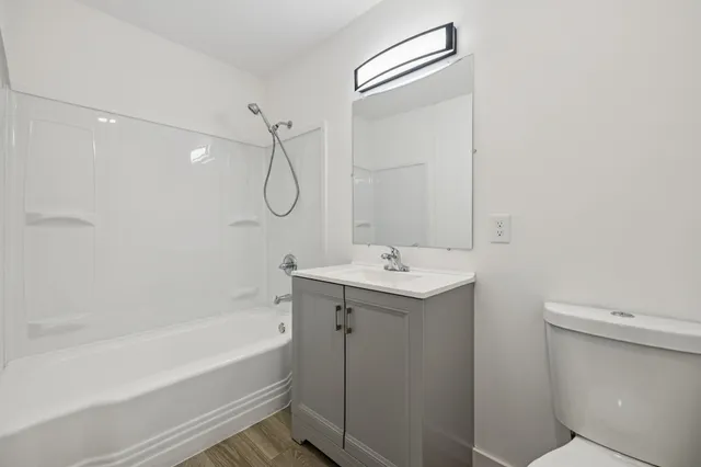 a view of entryway with wooden floor