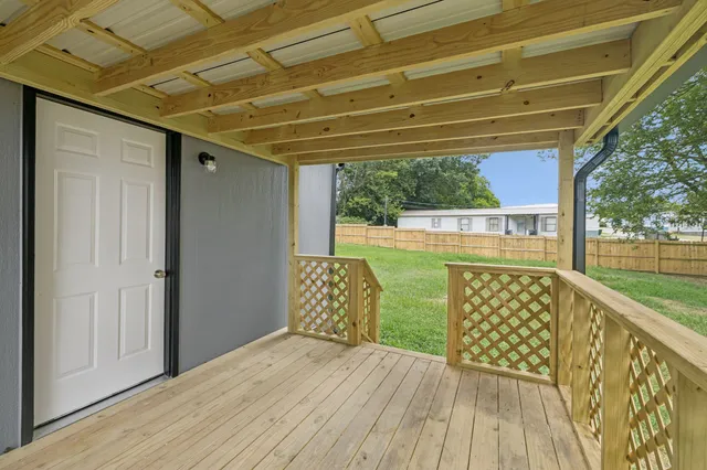 a view of a backyard with a garden