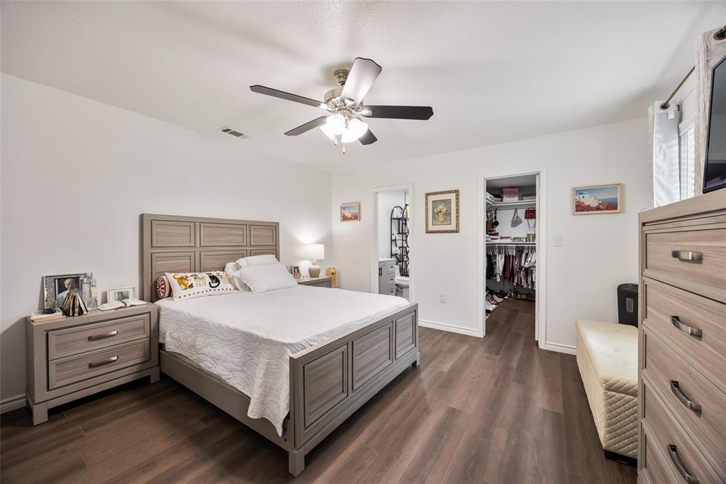 1005 Iowa Street Irving, TX 75060 - Photo 16 of 23 a bedroom with a bed and a dresser
