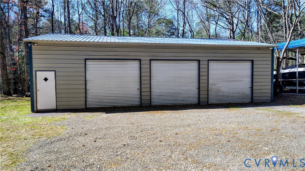 9514 Squirrel Level Road Petersburg, VA 23803 - Photo 32 of 32 3 Car - 30 x 48 Garage with Wood Stove!