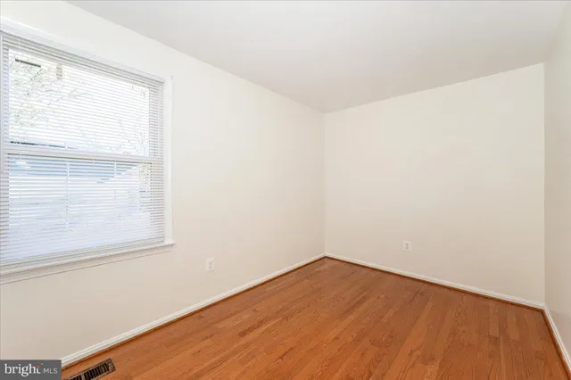 a view of a room that has a window in it