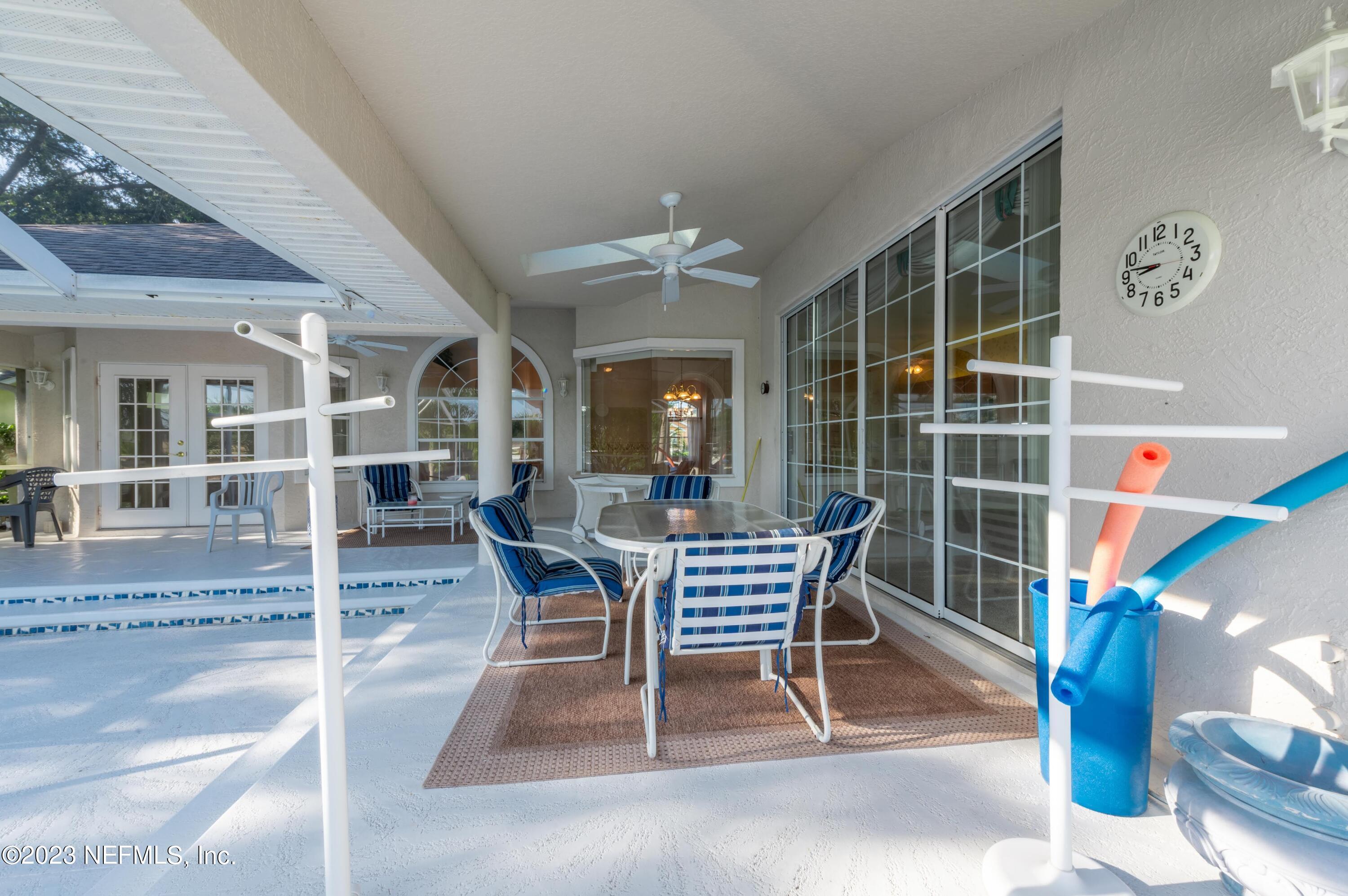 13 Clear Court Palm Coast, FL 32137 - Photo 13 of 60 a dining room with furniture and window