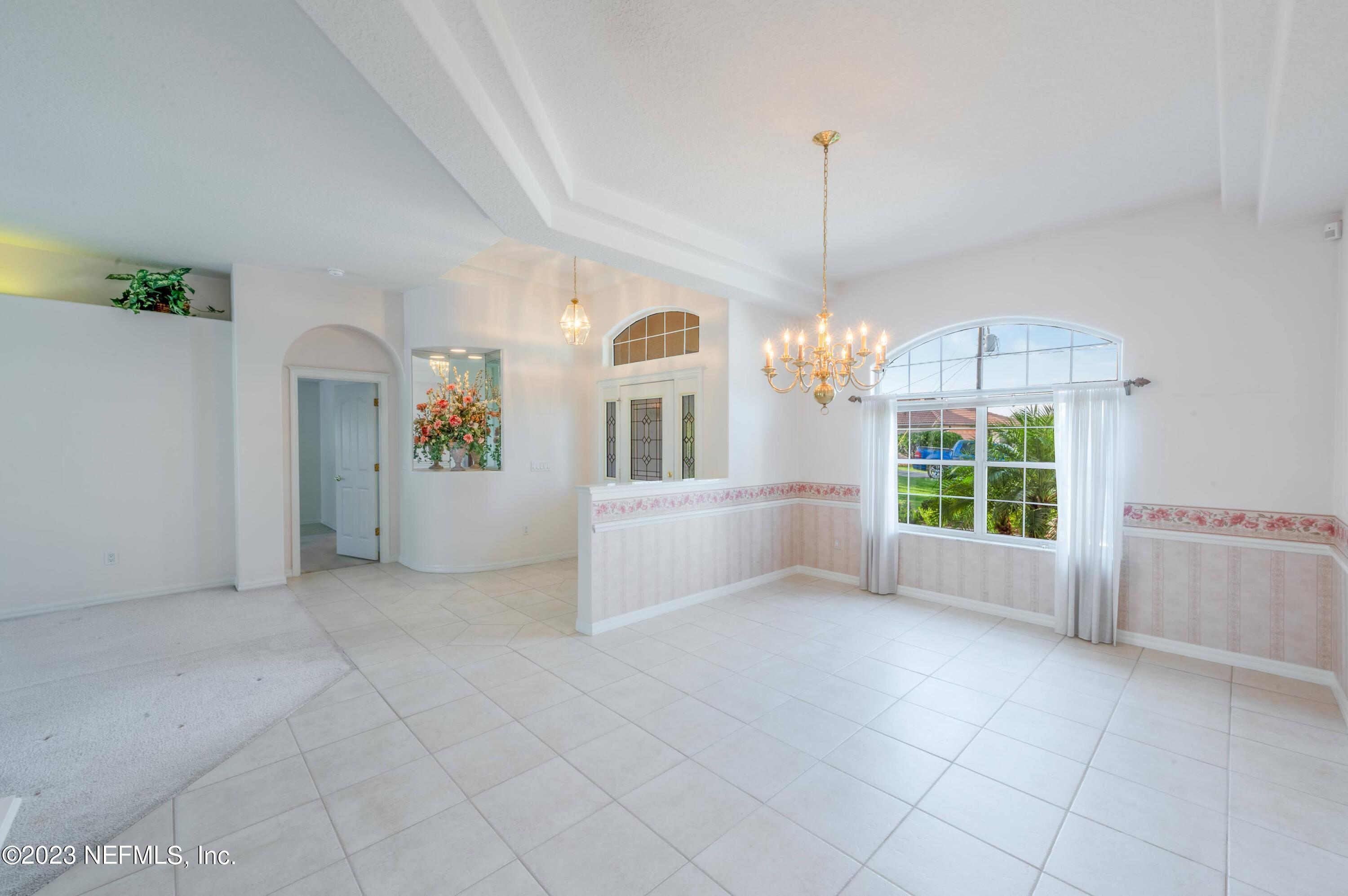 13 Clear Court Palm Coast, FL 32137 - Photo 25 of 60 a view of livingroom with windows