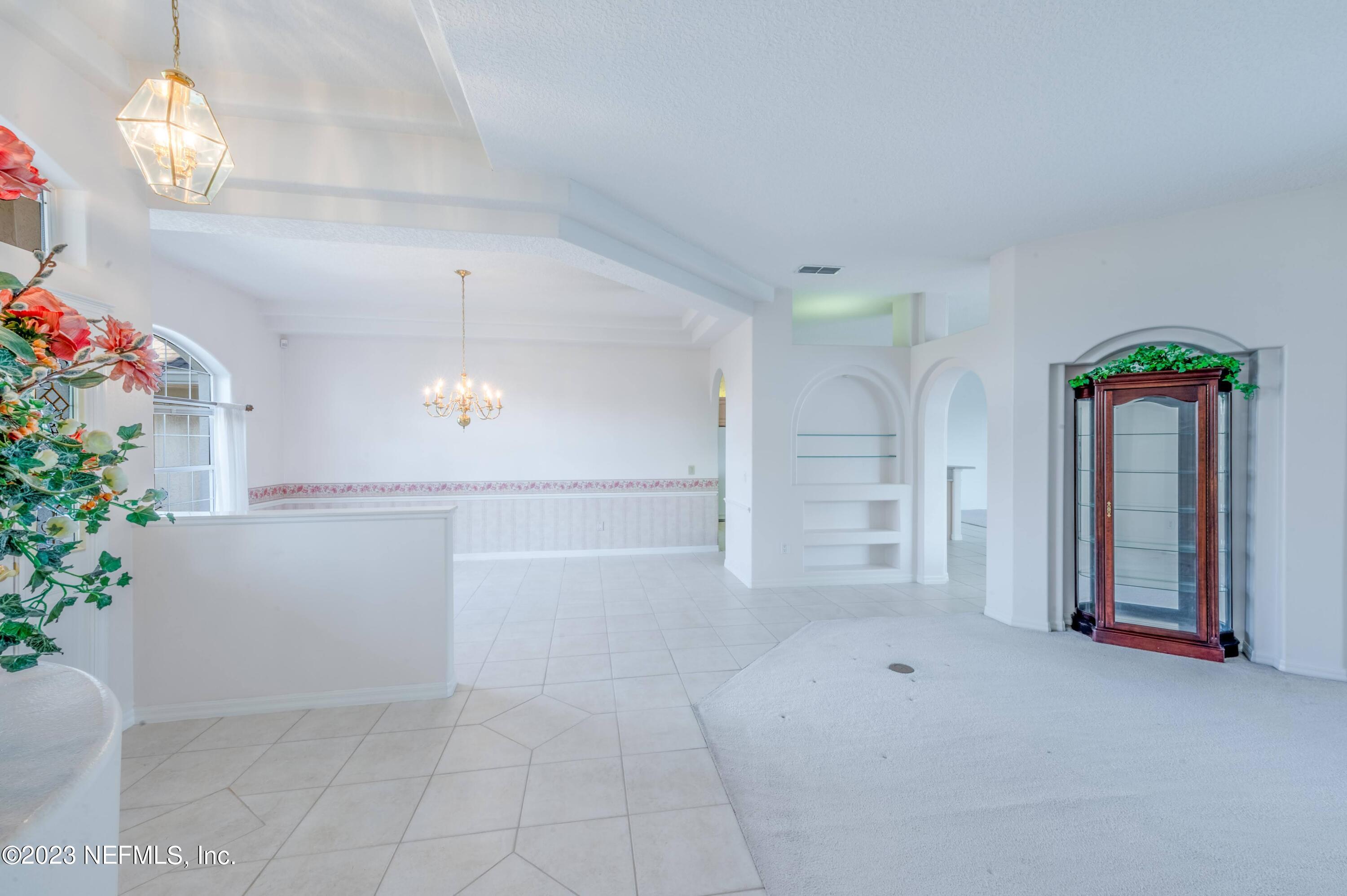 13 Clear Court Palm Coast, FL 32137 - Photo 30 of 60 a view of empty room with an empty room