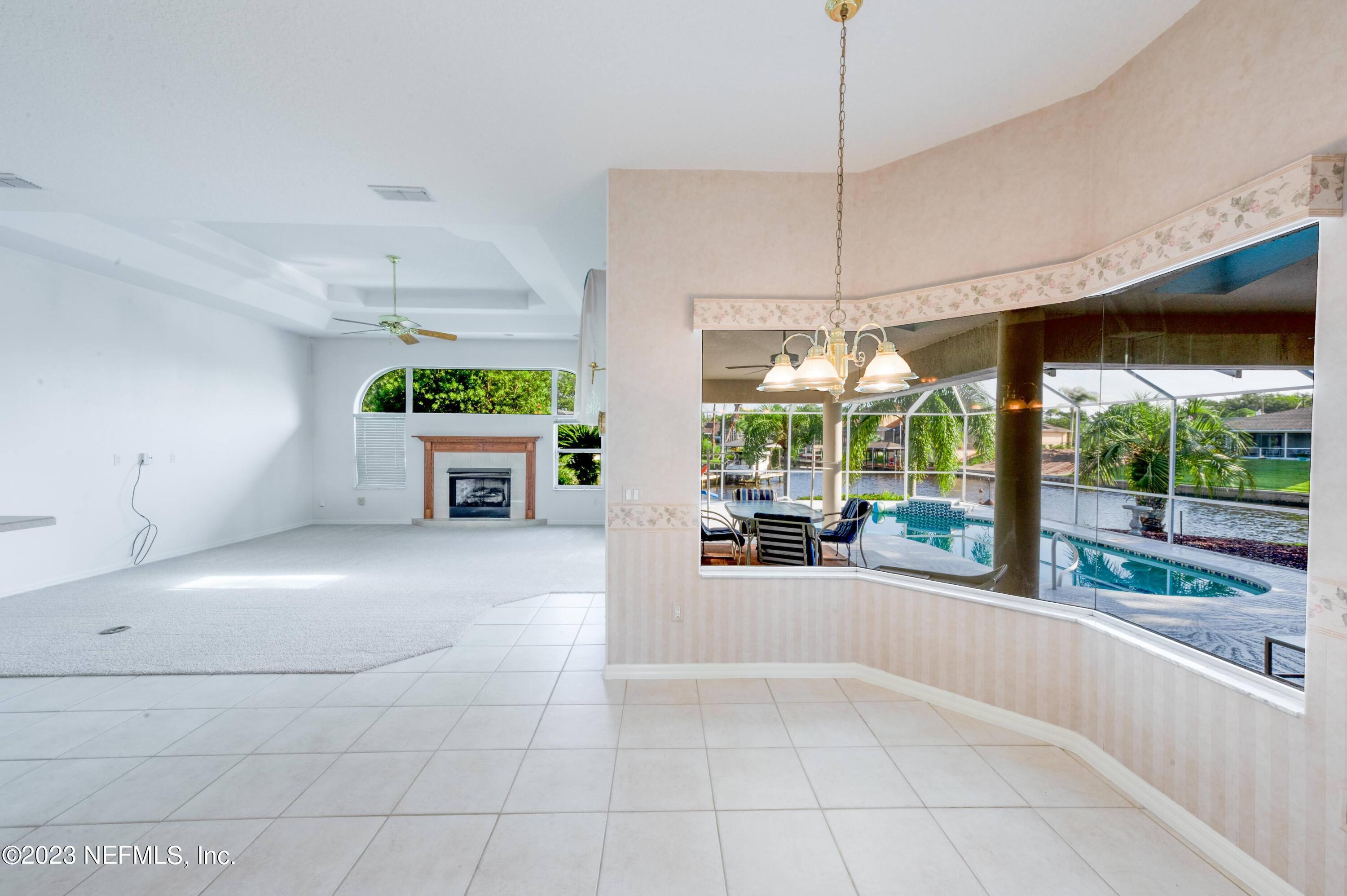 13 Clear Court Palm Coast, FL 32137 - Photo 39 of 60 a view of an empty room with a window