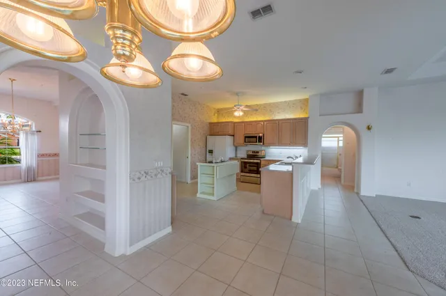 a utility room with a sink washer and dryer