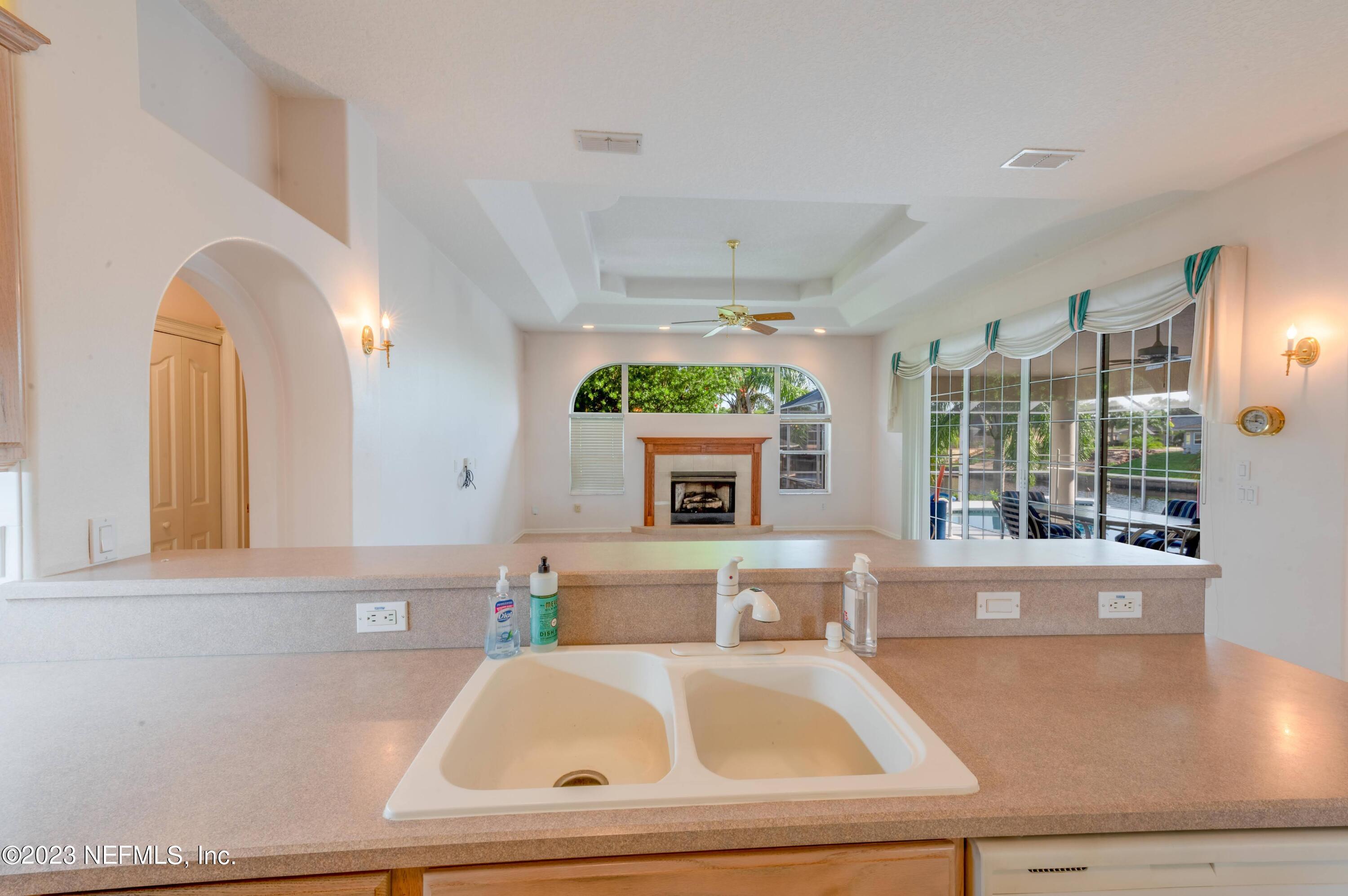 13 Clear Court Palm Coast, FL 32137 - Photo 46 of 60 a view of a living room and window