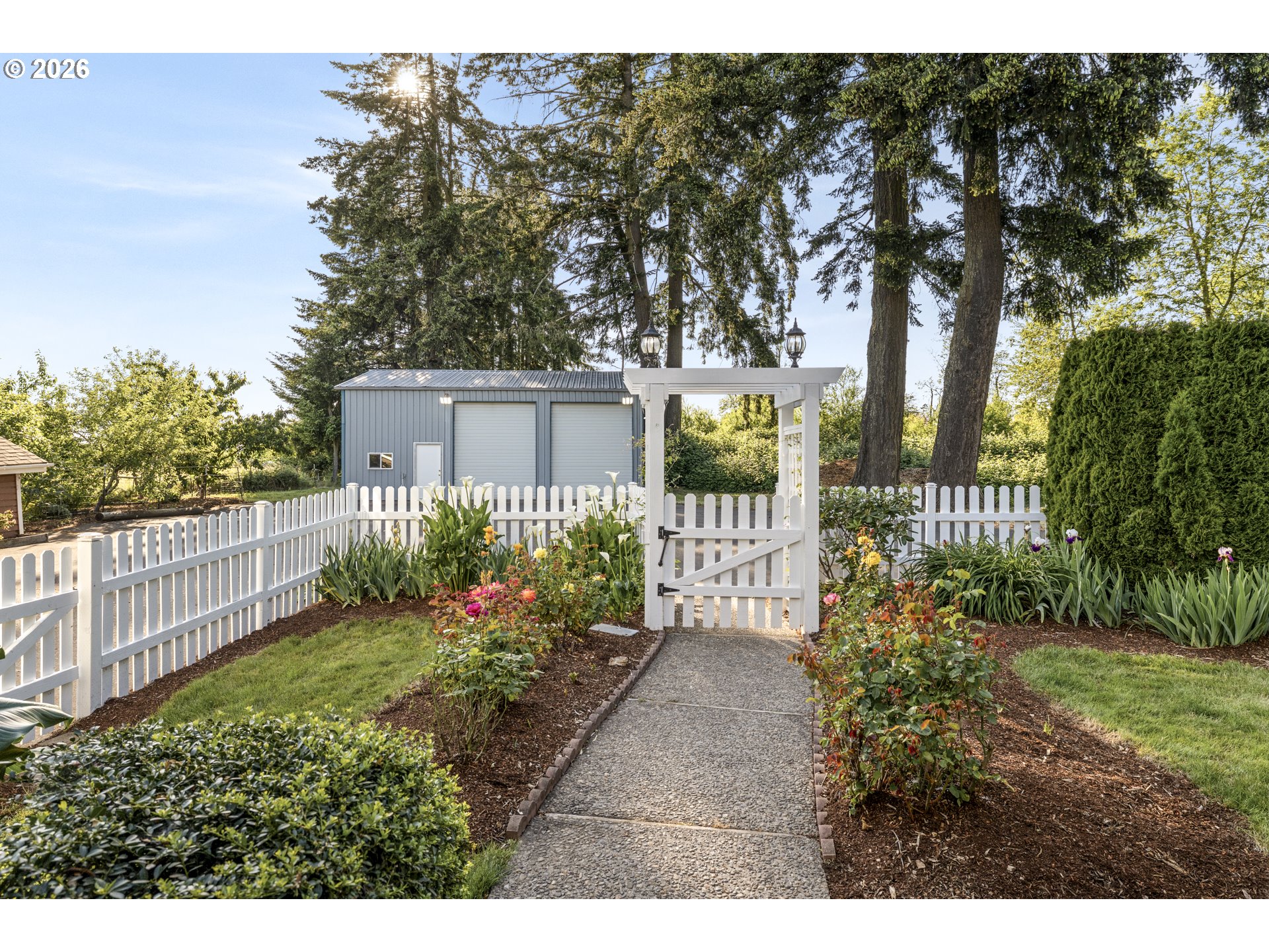4515 Cordon Road Northeast Salem, OR 97305 - Photo 28 of 48 a view of a garden filled with lots of flower plants