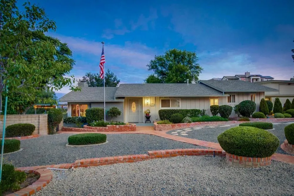 2955 Olive View Road Alpine, CA 91901 - Photo 4 of 32 a front view of a house with a yard and potted plants