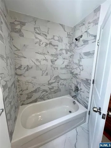 a bathroom with a bathtub