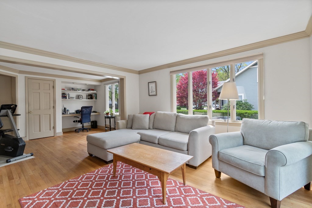 427 Main Street Hingham, MA 02043 - Photo 14 of 42 a living room with furniture and a large window