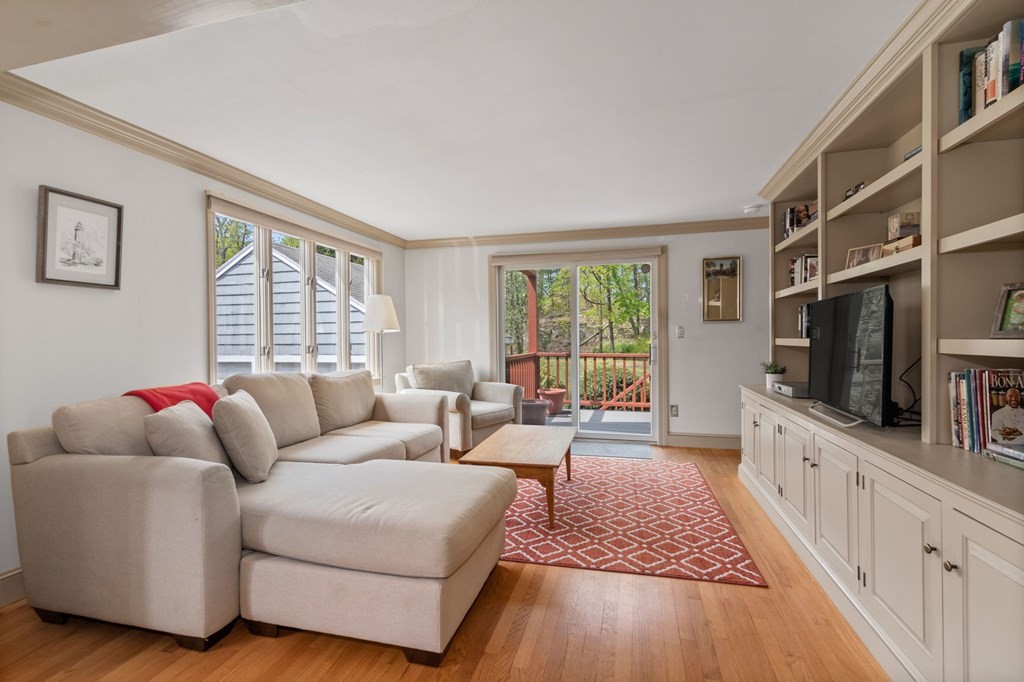 427 Main Street Hingham, MA 02043 - Photo 15 of 42 a living room with furniture and a flat screen tv