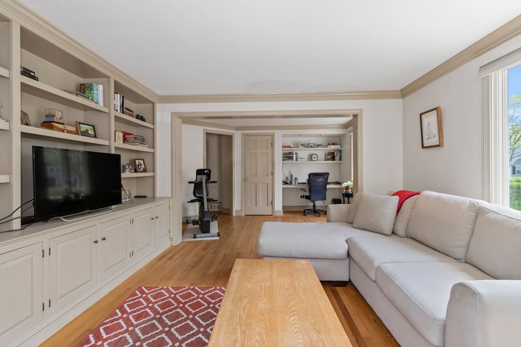 427 Main Street Hingham, MA 02043 - Photo 16 of 42 a living room with furniture and a flat screen tv