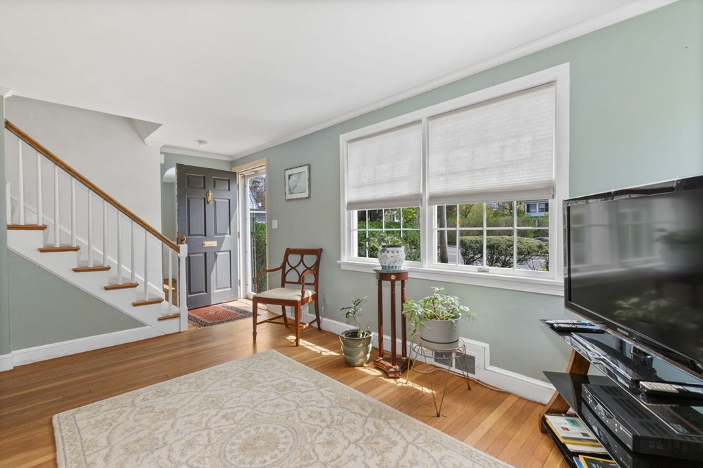 427 Main Street Hingham, MA 02043 - Photo 20 of 42 a view of a livingroom with furniture hardwood floor and a window