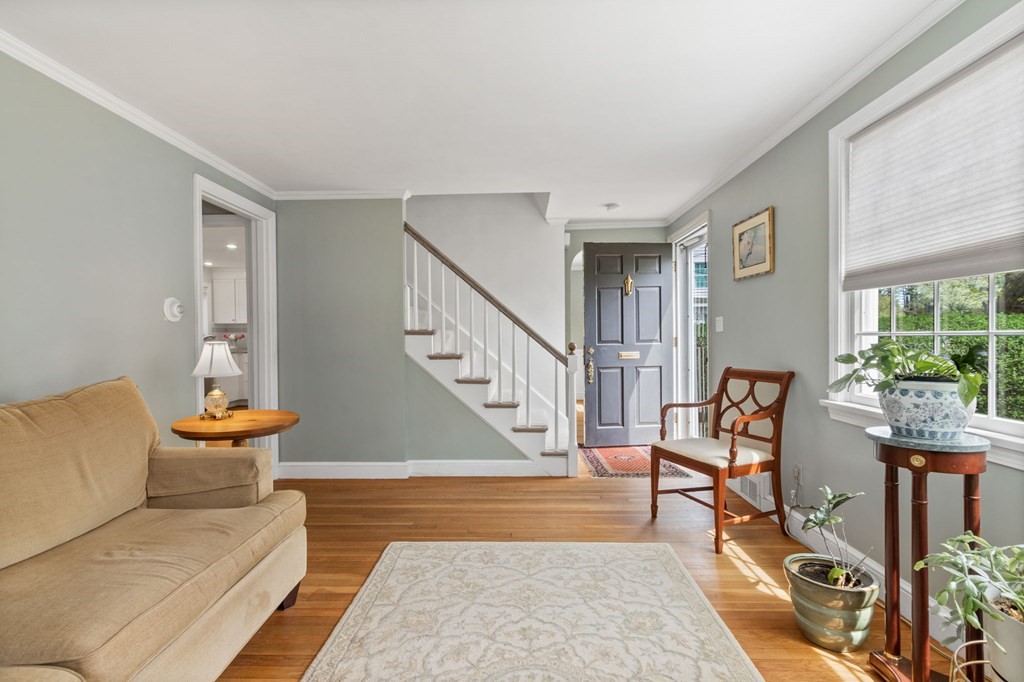 427 Main Street Hingham, MA 02043 - Photo 21 of 42 a living room with furniture and a potted plant