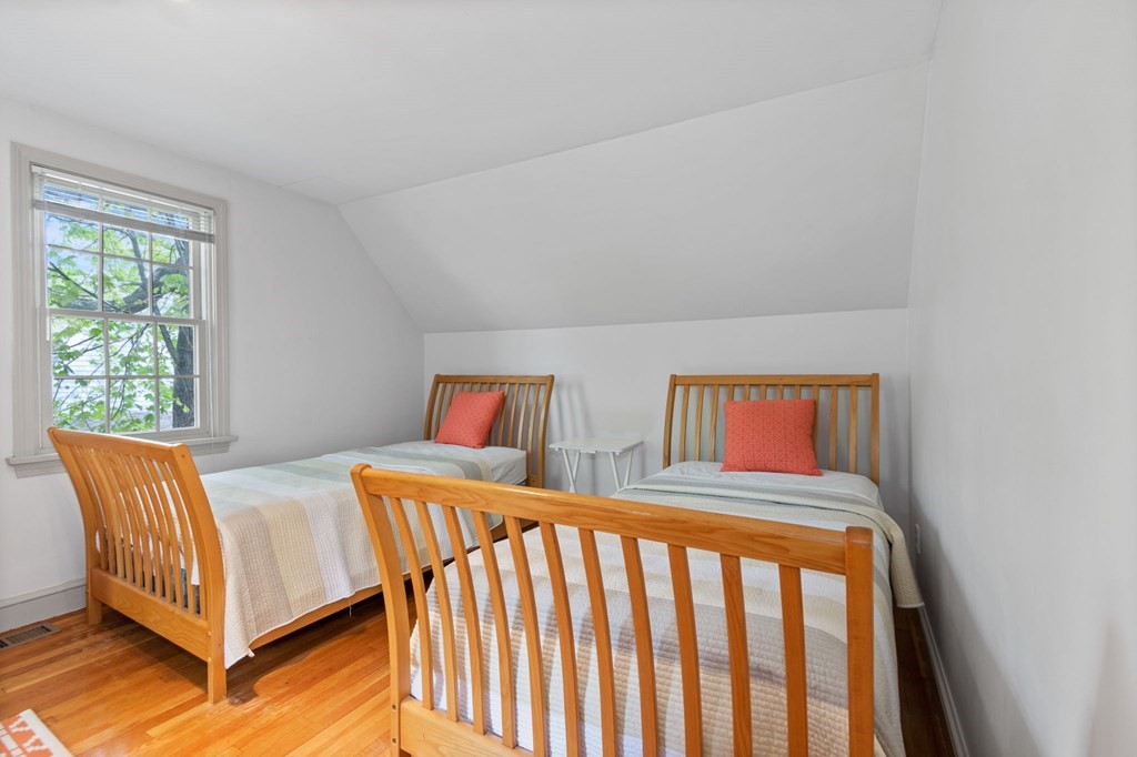 427 Main Street Hingham, MA 02043 - Photo 31 of 42 a bedroom with two beds and a two couches chair