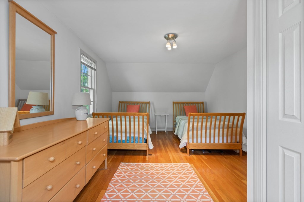 427 Main Street Hingham, MA 02043 - Photo 32 of 42 a bedroom with furniture and a window