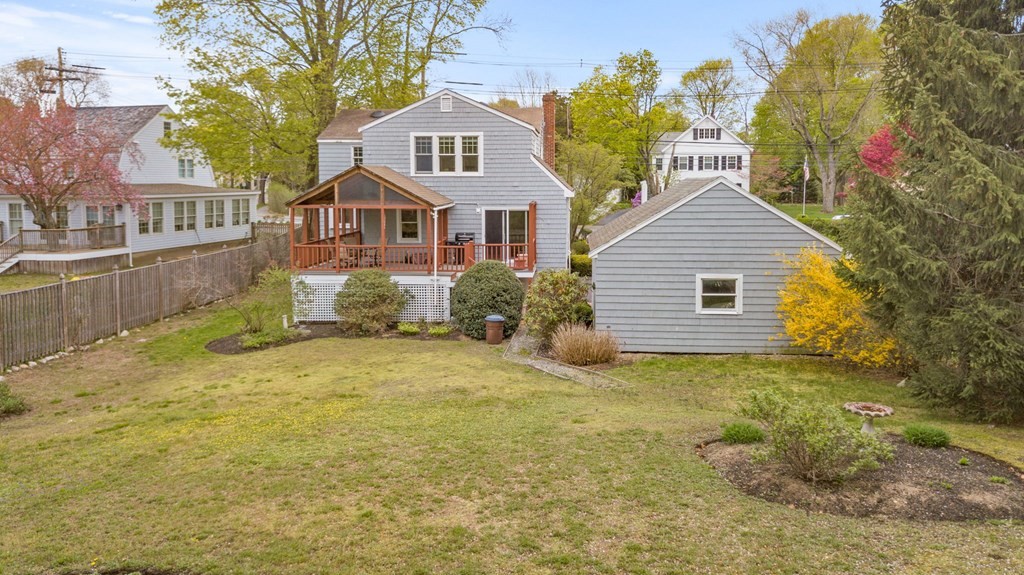 427 Main Street Hingham, MA 02043 - Photo 38 of 42 a front view of a house with a yard