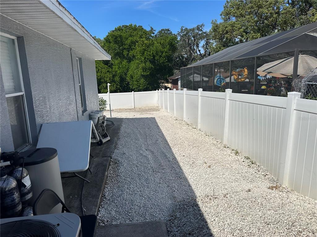 6125 Mariner Boulevard Spring Hill, FL 34608 - Photo 21 of 24 a view of a porch with a chair