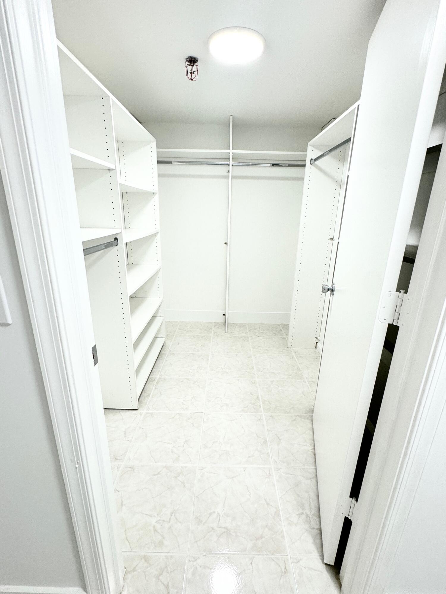 9170 Southwest 14th Street, Unit 4405 Boca Raton, FL 33428 - Photo 12 of 48 a view of closet area