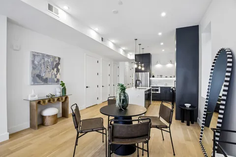 a view of a dining room with furniture
