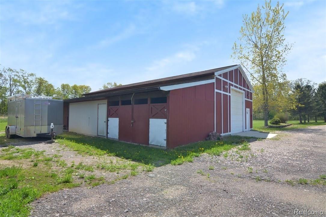 6415 Hogan Road Fenton, MI 48430 - Photo 47 of 72 Lean-to off the side of the barn