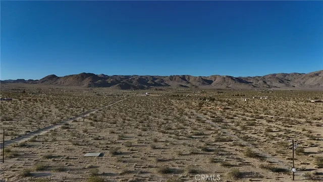 a view of outdoor space and mountain view
