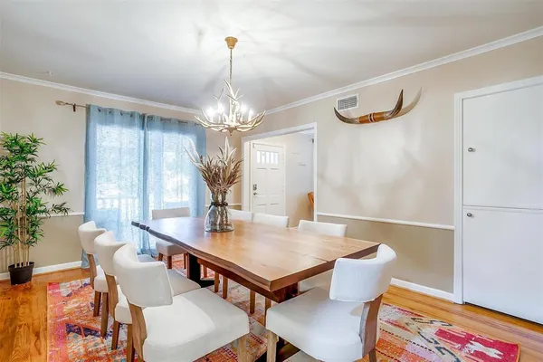 a view of a livingroom with furniture and a table
